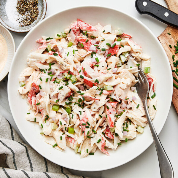 Crab salad in a bowl with a spoon