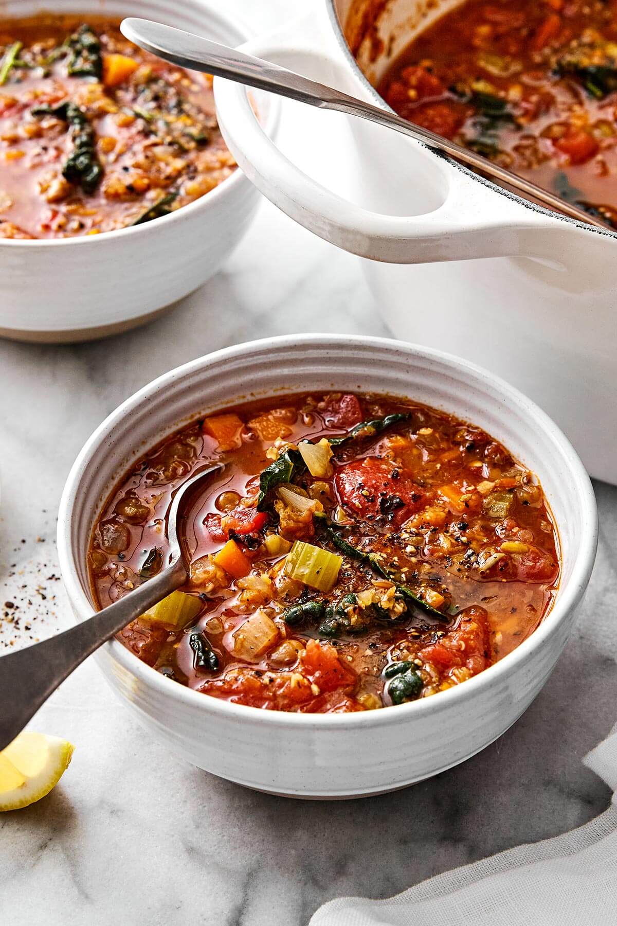 Lentil soup is the perfect vegetarian meal to cozy up with for fall and winter. It’s hearty, healthy, and wonderfully filling thanks to its plant-based protein. And while there are many variations of lentil soup, this simple and vibrant Mediterranean version is extra special. Bowls of Mediterranean lentil soup.