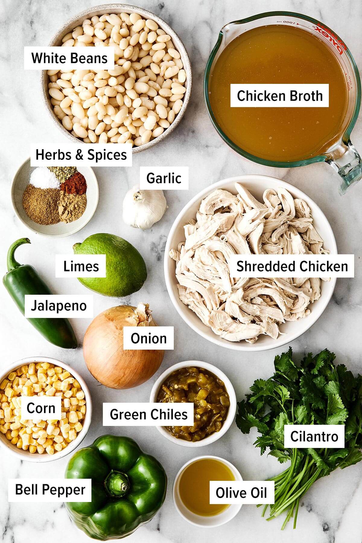 This white chicken chili is a fall/winter comfort food favorite and a flavorful blend of tender chicken, white beans, sweet corn, green chiles, and more! Ingredients for white chicken chili.